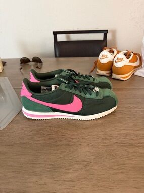 Nike Dark Green Sneakers with Pink Swoosh